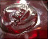 Signature d'Auguste Jean, Jean. Pastille de verre appliquée à chaud. Entre 1877 et 1884.