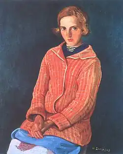 Portrait d'une jeune fille dans un spencer à carreaux