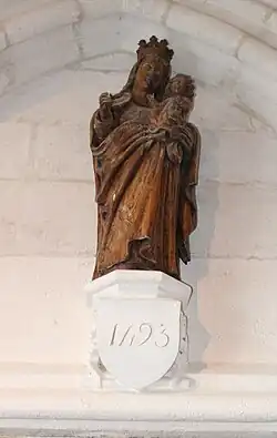 Statue en bois de la Vierge à l'enfant datée de 1493.