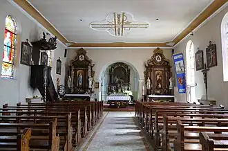 Vue intérieure de la nefvers le chœur.