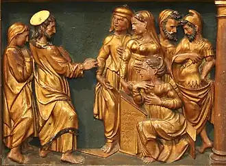 Marie-Madeleine écoute la prédication de Jésus.