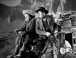 Buck Rickabaugh V et le shérif Curly Wilcox (Andy Devine et George Bancroft).