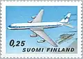 Timbre à fond bleu, représentant un DC-8 blanc et bleu en vol.