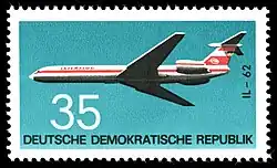 tons bleus, représentant un Il-62 marqué « interflug ».