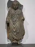 Buddha debout. Gandhara, Ier – IIIe siècle. Schiste. Musée Guimet.