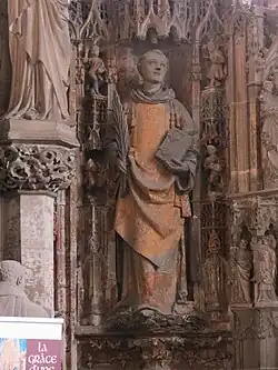 Photo de la statue polychrome de saint Étienne, sculptée par Pierre des Aubeaux en 1512