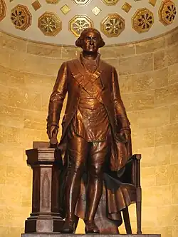 Photo en couleurs d'une statut en bronze de Georges Washington.