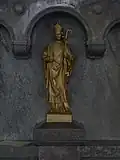 Statue de saint Blaise se trouvant du côté gauche de l'entrée