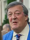 Stephen Fry dans le rôle de Gilbert / Le Lopin du Ménétrier