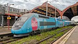 Rames TGV en livrée Ouigo, stationnées à quai.