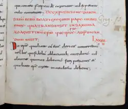 Le bas d'une page manuscrite rédigée à l'encre rouge puis noire