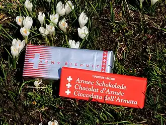 Biscuit militaire commercialisé par Kambly sous licence exclusive de l’armée et chocolat militaire suisse