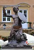 Syrenka statue on Old Town Market square in Warsaw