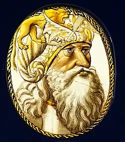 Tête d'homme au turban avec un combat d'animaux,