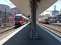 Deux AGC en livrée liO (TER Occitanie) en gare de Toulouse-Matabiau