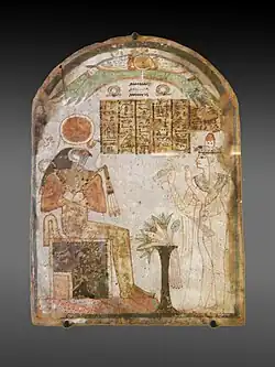 Stèle funéraire de Tachémès en prière devant Rê-Horakhty, v. 900. Bois stuqué et peint. H. 25 cm. Louvre