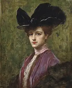 Élégante au chapeau noir (1900).