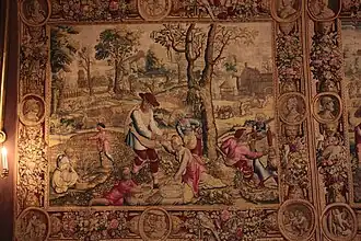 Photographie en couleurs d'une tapisserie ancienne.