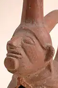 Figurine d'argile de la culture mochica avec labret.
