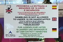 Ce paneau à Ténérife utilise  pour l'espagnol,  pour l'anglais et  pour l'allemand.