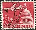 Timbre dans les tons rouges, US Air mail, représentant un DC-8 au-dessus du Capitole (de Washington).