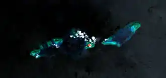 Image satellite de l'île Thitu et des récifs Thitu prise par la NASA en 2000.