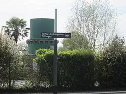 Pancarte indiquant le nom de la halte.