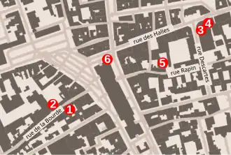 Plan en couleurs d'une ville avec des repères numérotés.