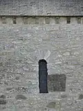Fenêtre romane (mur nord de la nef)
