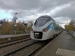 TER Fluo Grand Est quittant la gare de Hoeheim en 2023.