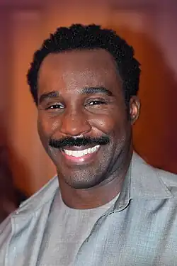 Tramell Tillman, interprète Seth Milchick