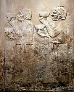 Porteurs de tribut d'Urartu. Musée national d'Irak.