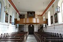 Vue intérieure de la nefvers la tribune d'orgue.