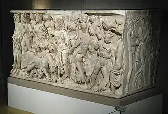 Triomphe de Dionysos : face en haut-relief. Côté en bas-relief : satyre nu enlaçant, devant un autel, une bacchante joueuse de lyre. L. 2,22&nbsp;m. Lugdunum