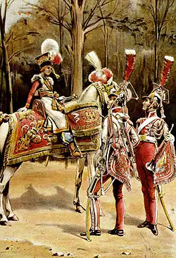 Un timbalier à cheval et deux trompettes à pied.