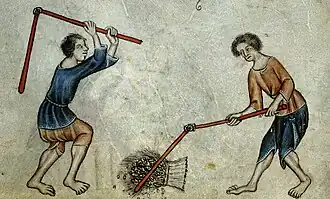 Deux hommes battant le blé, 1325-1335, psaumes (British Library).