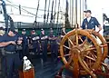 Barre à roue en bois sur un vieux gréement : USS Constitution.