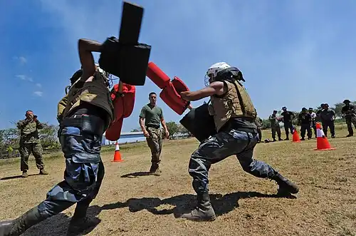 US Navy 110324-N-WX845-656 U.S. Marine Sgt. Michael Roth, assigned to Marine Corps Training and Advisory Group, observes Nicaraguan sailors and sol