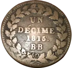 Avers et revers de la pièce d'un décime frappée en 1815 à Strasbourg au modèle Louis XVIII.