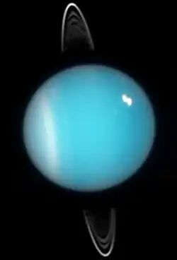 Uranus en 2005. Les anneaux, le col sud et un nuage brillant dans l'hémisphère nord sont visibles.