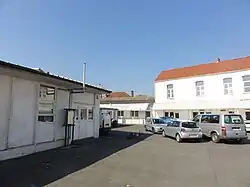 La tête de puits matérialisée dans son environnement.