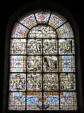 Vitrail de l'église, sur la vie de Jésus-Christ.