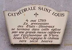 Plaque commémorative apposée sur la façade de la cathédrale et commémorant la procession du 4 mai 1789.