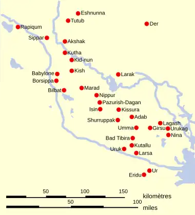 Photographie d'une carte parsemée de nombreux points rouges symbolisant l'emplacement des cités