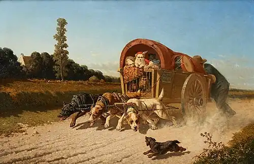 Ménagerie tractée par des chiens.