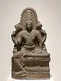 Vishnou en Lalitasana. Statue du VIIIe siècle de style Pallava et d'origine sud-indienne.