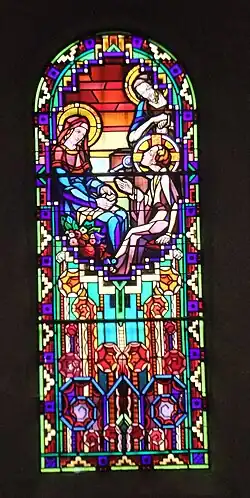 Vitrail figuratif, tons bleus et rouges