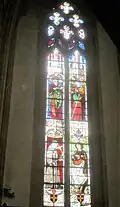 vitrail de gauche du chœur de l'église Saint-Jean-Baptiste