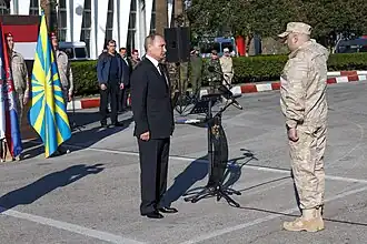Prise de parole du président de la fédération de Russie à l'aéroport militaire de Lattaquié, en Syrie, le 11 décembre 2017.