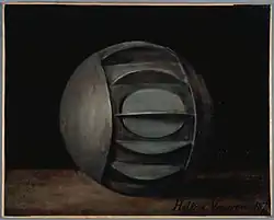 Photographie en couleurs d'une peinture représentant une sphère à ailettes.